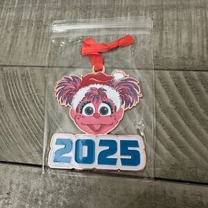 Sesame Place 2025 Ornament (Sesame Street Abby)